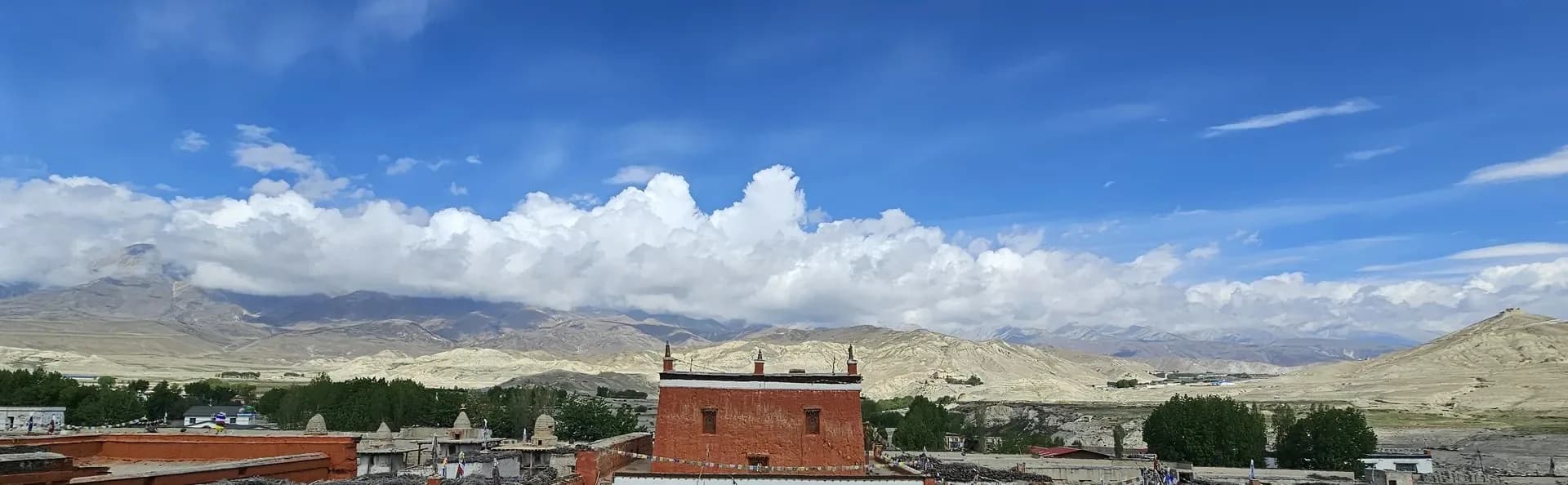 Walled settlement and monastery seen from the ridge above